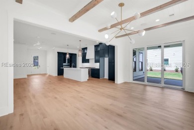 Set on nearly half an acre, this 3 bedroom, 2.5 bath home on Hampton Pointe Golf Course in South Carolina - for sale on GolfHomes.com, golf home, golf lot