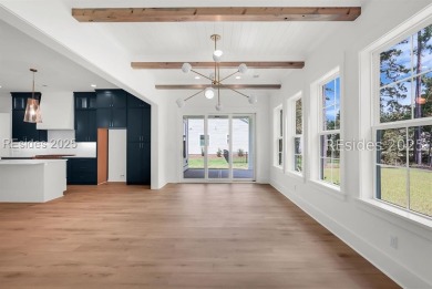 Set on nearly half an acre, this 3 bedroom, 2.5 bath home on Hampton Pointe Golf Course in South Carolina - for sale on GolfHomes.com, golf home, golf lot