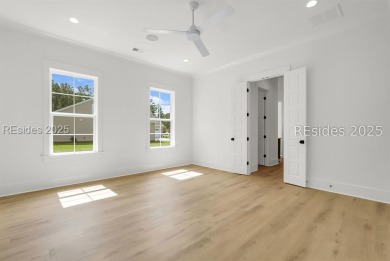 Set on nearly half an acre, this 3 bedroom, 2.5 bath home on Hampton Pointe Golf Course in South Carolina - for sale on GolfHomes.com, golf home, golf lot