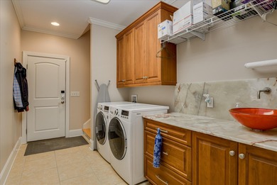 This elegant, custom-built home epitomizes the gracious southern on The Reserve Club At Woodside Plantation in South Carolina - for sale on GolfHomes.com, golf home, golf lot