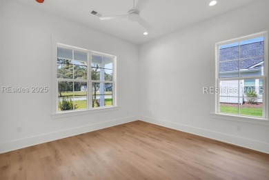 Set on nearly half an acre, this 3 bedroom, 2.5 bath home on Hampton Pointe Golf Course in South Carolina - for sale on GolfHomes.com, golf home, golf lot