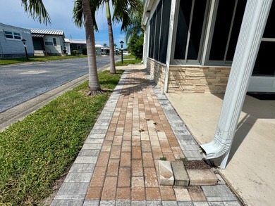 Updated 1968 Mobile Home on a Corner Lot - In the Center of on Heather Hills Golf Course in Florida - for sale on GolfHomes.com, golf home, golf lot