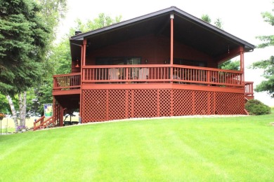 Welcome to this 3 bedroom, 3 bath live edge cedar sided home on Lake Carroll Golf Course in Illinois - for sale on GolfHomes.com, golf home, golf lot