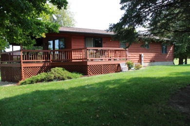 Welcome to this 3 bedroom, 3 bath live edge cedar sided home on Lake Carroll Golf Course in Illinois - for sale on GolfHomes.com, golf home, golf lot