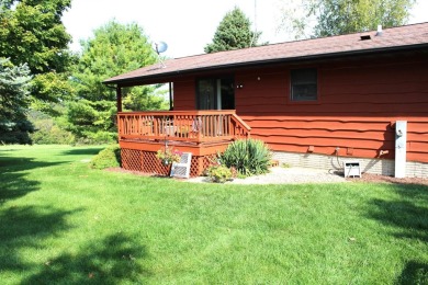 Welcome to this 3 bedroom, 3 bath live edge cedar sided home on Lake Carroll Golf Course in Illinois - for sale on GolfHomes.com, golf home, golf lot