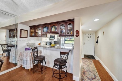 This 2 bedroom 2 bath Whitehall 1 condo features 1,385 sq ft of on Pine Island Ridge Country Club in Florida - for sale on GolfHomes.com, golf home, golf lot