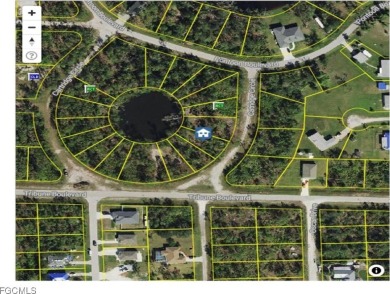 Pondfront Lot in Tropical Gulf Acres. Enjoy peaceful water views on Seminole Lakes Country Club in Florida - for sale on GolfHomes.com, golf home, golf lot