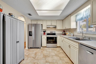 Welcome to this beautifully upgraded Chestnut model located in on The Links of Spruce Creek in Florida - for sale on GolfHomes.com, golf home, golf lot