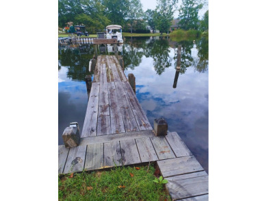 This spacious 1.01-acre partially cleared lot offers the perfect on Players Course At Wyboo Plantation in South Carolina - for sale on GolfHomes.com, golf home, golf lot