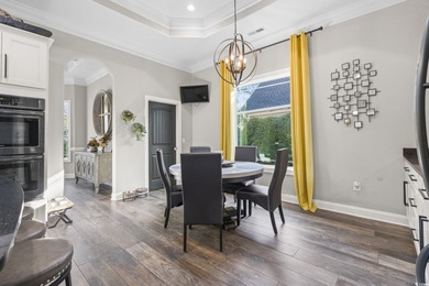 Welcome to this stunning custom-built 2021 stucco home on Wild Wing Plantation in South Carolina - for sale on GolfHomes.com, golf home, golf lot