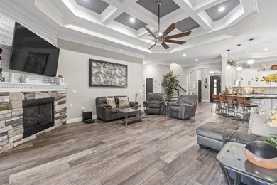 Welcome to this stunning custom-built 2021 stucco home on Wild Wing Plantation in South Carolina - for sale on GolfHomes.com, golf home, golf lot