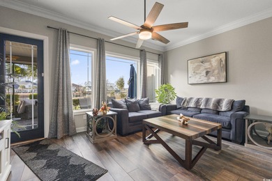 Welcome to this stunning custom-built 2021 stucco home on Wild Wing Plantation in South Carolina - for sale on GolfHomes.com, golf home, golf lot