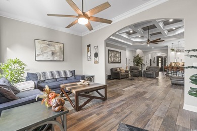 Welcome to this stunning custom-built 2021 stucco home on Wild Wing Plantation in South Carolina - for sale on GolfHomes.com, golf home, golf lot