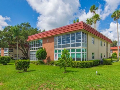 Welcome to Vista Royale! This beautifully updated 2-bedroom on The American Golf Club in Florida - for sale on GolfHomes.com, golf home, golf lot