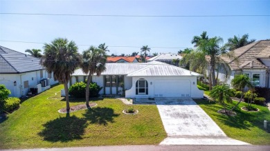 Punta Gorda Isles - Sailboat Gulf Access Waterfront Home with on Saint Andrews South Golf Club in Florida - for sale on GolfHomes.com, golf home, golf lot