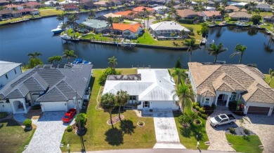 Punta Gorda Isles - Sailboat Gulf Access Waterfront Home with on Saint Andrews South Golf Club in Florida - for sale on GolfHomes.com, golf home, golf lot