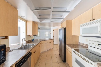 Punta Gorda Isles - Sailboat Gulf Access Waterfront Home with on Saint Andrews South Golf Club in Florida - for sale on GolfHomes.com, golf home, golf lot