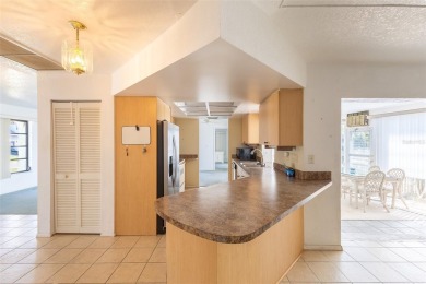 Punta Gorda Isles - Sailboat Gulf Access Waterfront Home with on Saint Andrews South Golf Club in Florida - for sale on GolfHomes.com, golf home, golf lot