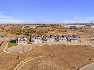 Discover modern, low-maintenance luxury living in this stunning on The Golf Club of Kansas in Kansas - for sale on GolfHomes.com, golf home, golf lot