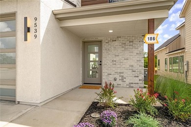 Discover modern, low-maintenance luxury living in this stunning on The Golf Club of Kansas in Kansas - for sale on GolfHomes.com, golf home, golf lot