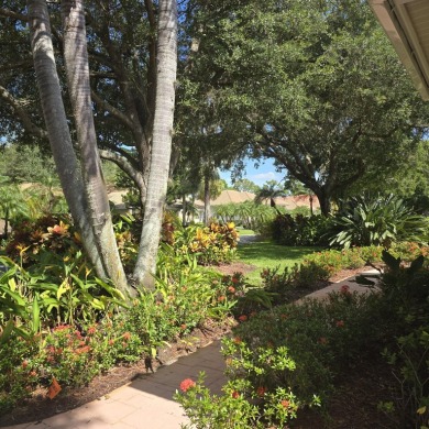 Welcome to 8212 Kiawah Trace, an exquisite custom-built on PGA Golf Club in PGA Village in Florida - for sale on GolfHomes.com, golf home, golf lot
