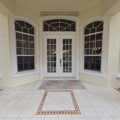 Welcome to 8212 Kiawah Trace, an exquisite custom-built on PGA Golf Club in PGA Village in Florida - for sale on GolfHomes.com, golf home, golf lot