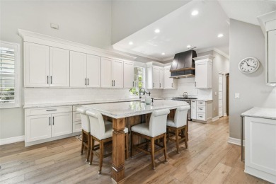 Step into this beautifully renovated 4-bedroom, 3.5-bath home in on Palma Ceia Golf and Country Club in Florida - for sale on GolfHomes.com, golf home, golf lot