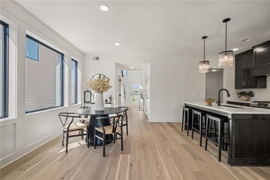 Discover modern, low-maintenance luxury living in this stunning on The Golf Club of Kansas in Kansas - for sale on GolfHomes.com, golf home, golf lot