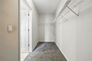 One or more photo(s) has been virtually staged. Live the Florida on Oaks National Golf Course in Florida - for sale on GolfHomes.com, golf home, golf lot