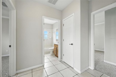 One or more photo(s) has been virtually staged. Live the Florida on Oaks National Golf Course in Florida - for sale on GolfHomes.com, golf home, golf lot