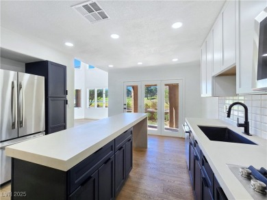 Stunning golf course views in the prestigious guard gated resort on Spanish Trail Golf and Country Club in Nevada - for sale on GolfHomes.com, golf home, golf lot