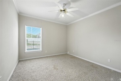 One or more photo(s) has been virtually staged. Live the Florida on Oaks National Golf Course in Florida - for sale on GolfHomes.com, golf home, golf lot