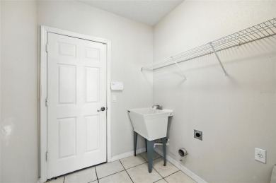 One or more photo(s) has been virtually staged. Live the Florida on Oaks National Golf Course in Florida - for sale on GolfHomes.com, golf home, golf lot