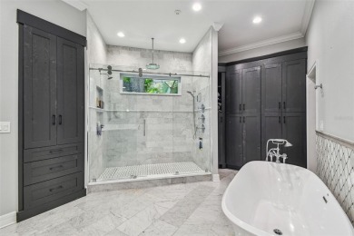 Step into this beautifully renovated 4-bedroom, 3.5-bath home in on Palma Ceia Golf and Country Club in Florida - for sale on GolfHomes.com, golf home, golf lot
