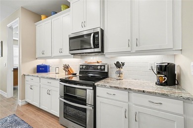 PARK THE GOLF CART, STORE THE TOYS, INVITE THE FRIENDS. THIS on Herons Glen Golf and Country Club in Florida - for sale on GolfHomes.com, golf home, golf lot