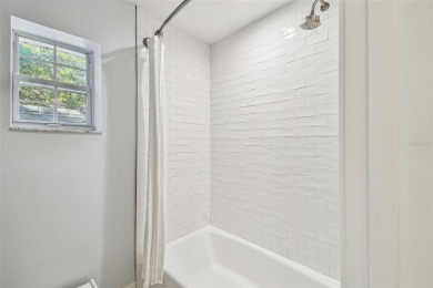 Step into this beautifully renovated 4-bedroom, 3.5-bath home in on Palma Ceia Golf and Country Club in Florida - for sale on GolfHomes.com, golf home, golf lot