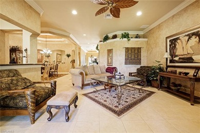 Experience refined coach home living in this beautifully on West Bay Beach and Golf Club in Florida - for sale on GolfHomes.com, golf home, golf lot