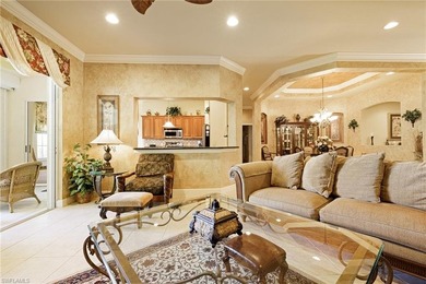 Experience refined coach home living in this beautifully on West Bay Beach and Golf Club in Florida - for sale on GolfHomes.com, golf home, golf lot