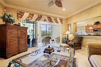 Experience refined coach home living in this beautifully on West Bay Beach and Golf Club in Florida - for sale on GolfHomes.com, golf home, golf lot