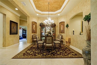Experience refined coach home living in this beautifully on West Bay Beach and Golf Club in Florida - for sale on GolfHomes.com, golf home, golf lot