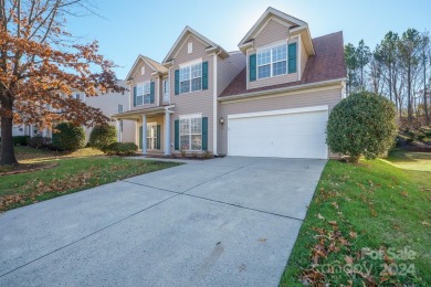 Charming home with 4 bedrooms, 2.5 baths with flex room and a on Highland Creek Golf Club in North Carolina - for sale on GolfHomes.com, golf home, golf lot