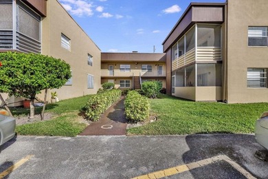 Discover the ultimate in luxury living at 802 Burgundy Q, a on Kings Point Golf -Flanders Way in Florida - for sale on GolfHomes.com, golf home, golf lot