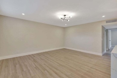 Discover the ultimate in luxury living at 802 Burgundy Q, a on Kings Point Golf -Flanders Way in Florida - for sale on GolfHomes.com, golf home, golf lot