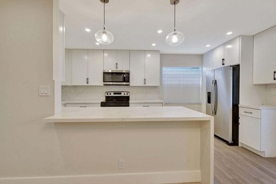 Discover the ultimate in luxury living at 802 Burgundy Q, a on Kings Point Golf -Flanders Way in Florida - for sale on GolfHomes.com, golf home, golf lot