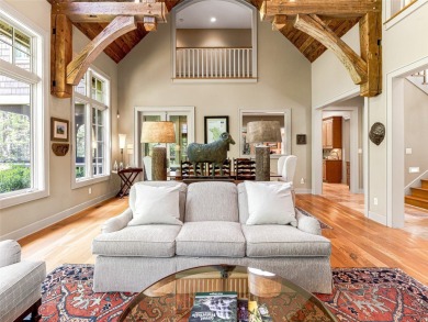 Overlooking the scenic 4th hole, this stunning 4-bedroom, 4 on Lake Toxaway Country Club in North Carolina - for sale on GolfHomes.com, golf home, golf lot