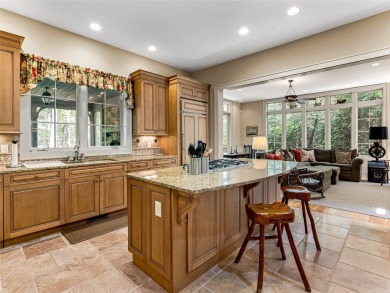 Overlooking the scenic 4th hole, this stunning 4-bedroom, 4 on Lake Toxaway Country Club in North Carolina - for sale on GolfHomes.com, golf home, golf lot