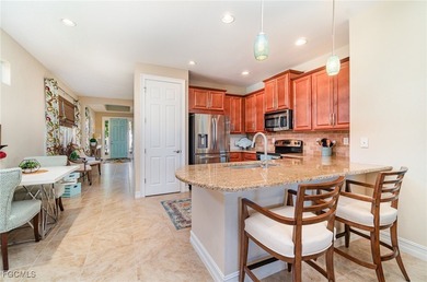 **NEW TILE ROOF** This home has it all! From the curb appeal on Herons Glen Golf and Country Club in Florida - for sale on GolfHomes.com, golf home, golf lot