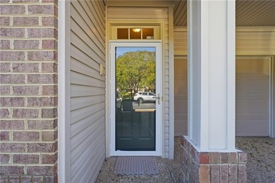 Second story condo with elevator. Covered balcony.  Large open on The Signature At West Neck in Virginia - for sale on GolfHomes.com, golf home, golf lot