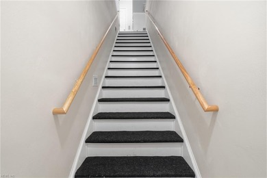 Second story condo with elevator. Covered balcony.  Large open on The Signature At West Neck in Virginia - for sale on GolfHomes.com, golf home, golf lot