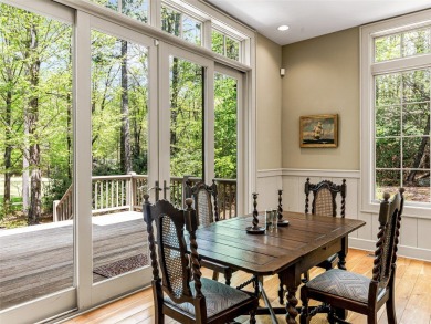 Overlooking the scenic 4th hole, this stunning 4-bedroom, 4 on Lake Toxaway Country Club in North Carolina - for sale on GolfHomes.com, golf home, golf lot